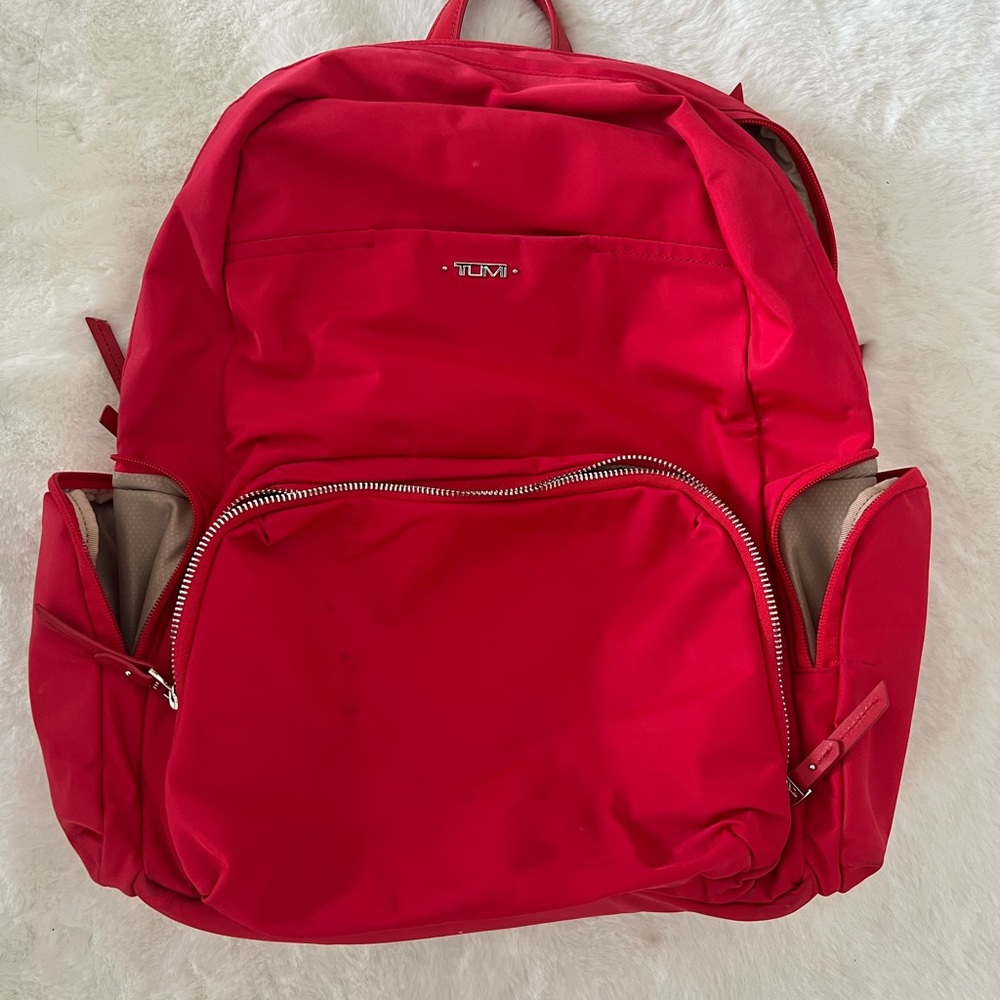 TUMI pink/red backpack